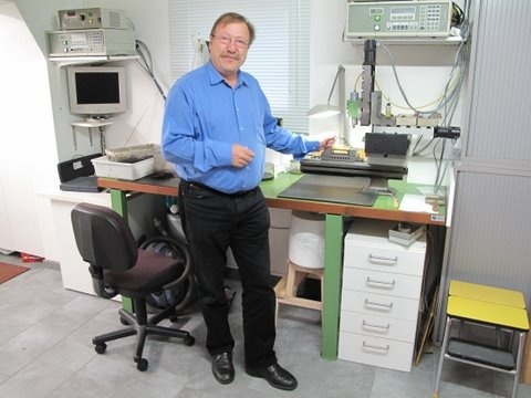 Paul standing in front of the machine he used to make my watches.