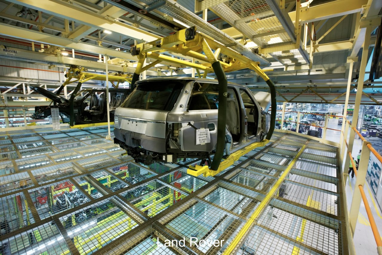 Highly automated, mechanical claws running on computers hold the cars as they make they their way pass the assembly stations.