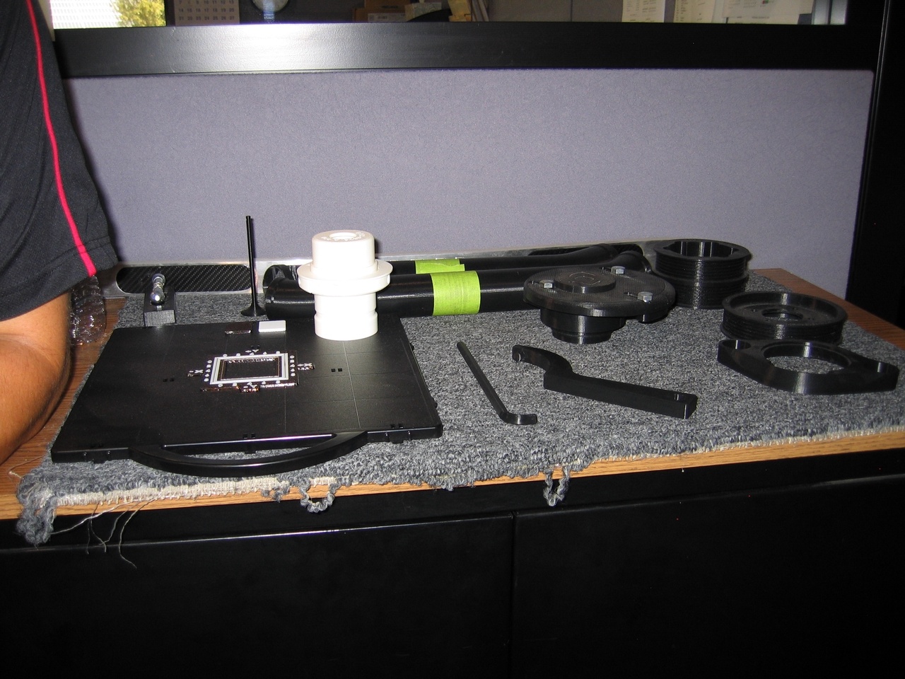 This is a 3D printer. These are parts made from a 3D printer.