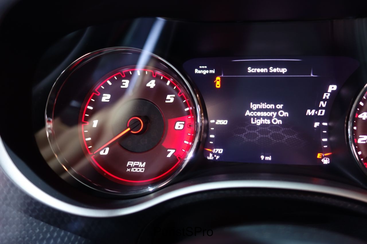 Notice the tachometer has a very low Redline. The valve is a pushrod design that doesn't allow high RPMs. 