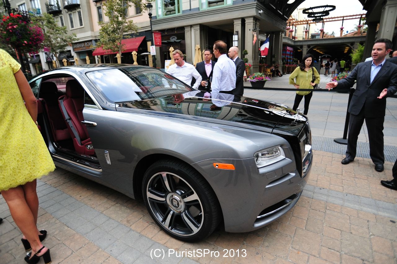 Black bonnet, roof, and boot... Silver bodied. 