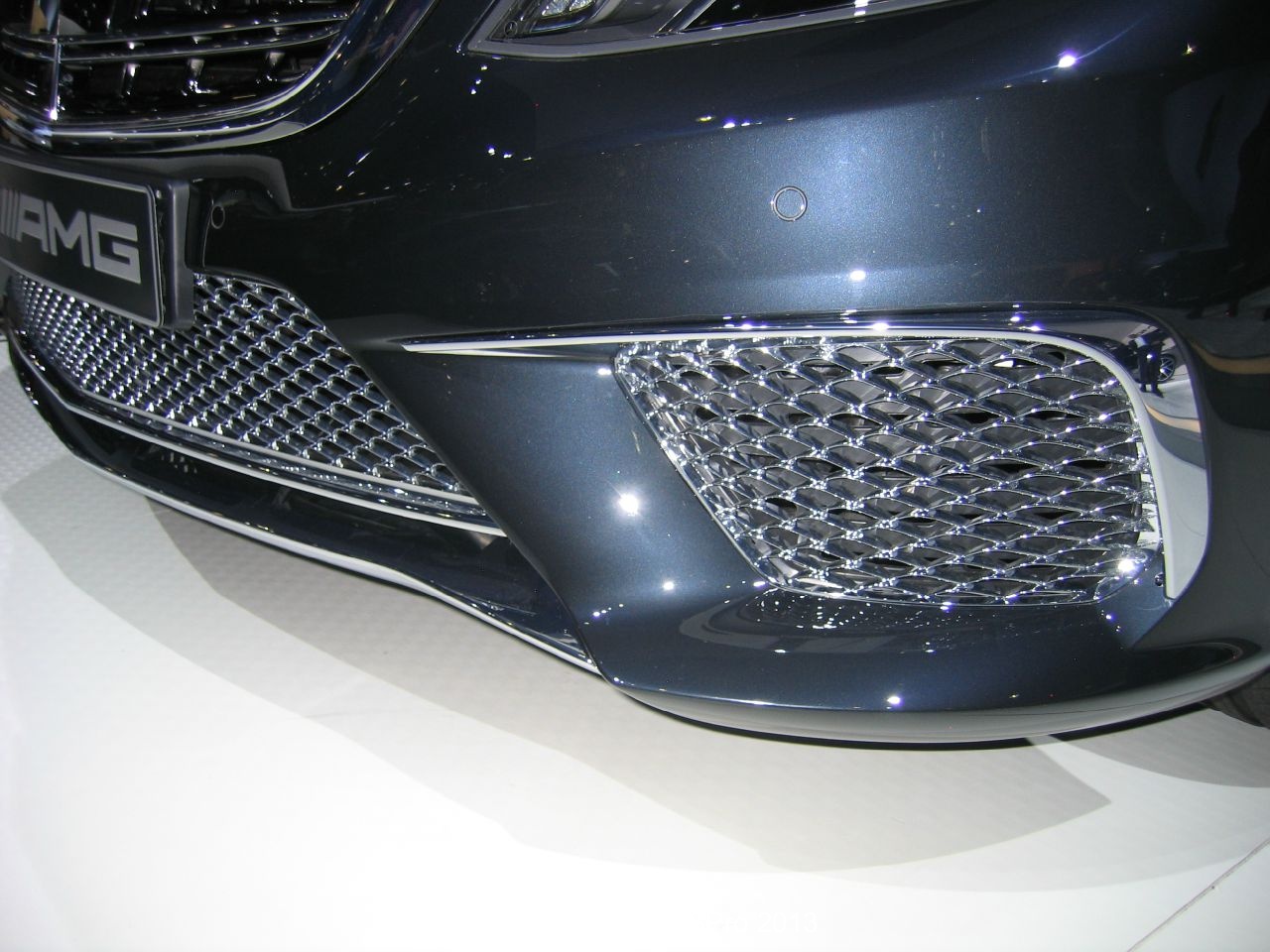 The entire grill mesh and surround is chromed. A little too much if you ask me...