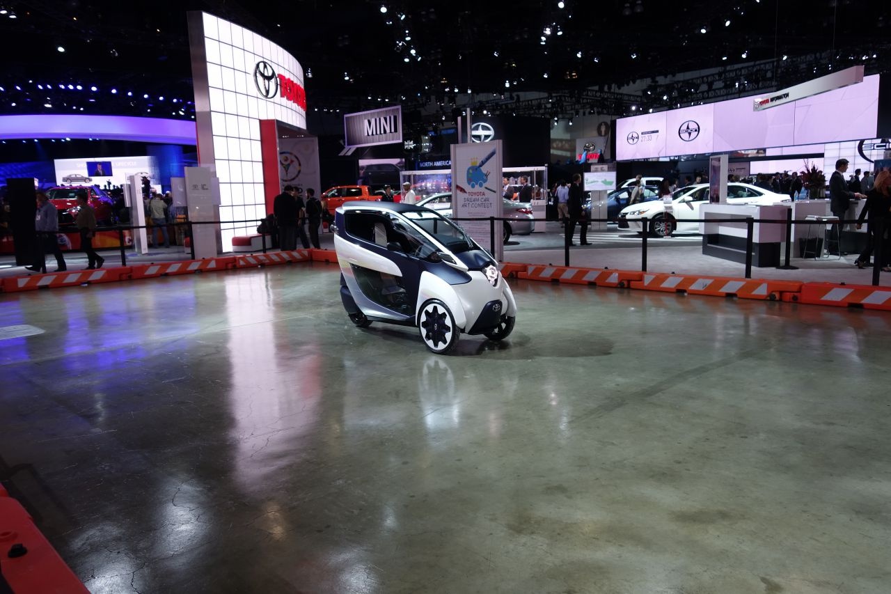 A fully enclosed motorcycle.