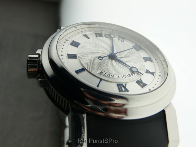 Silver Guilloche engine-turned dial.