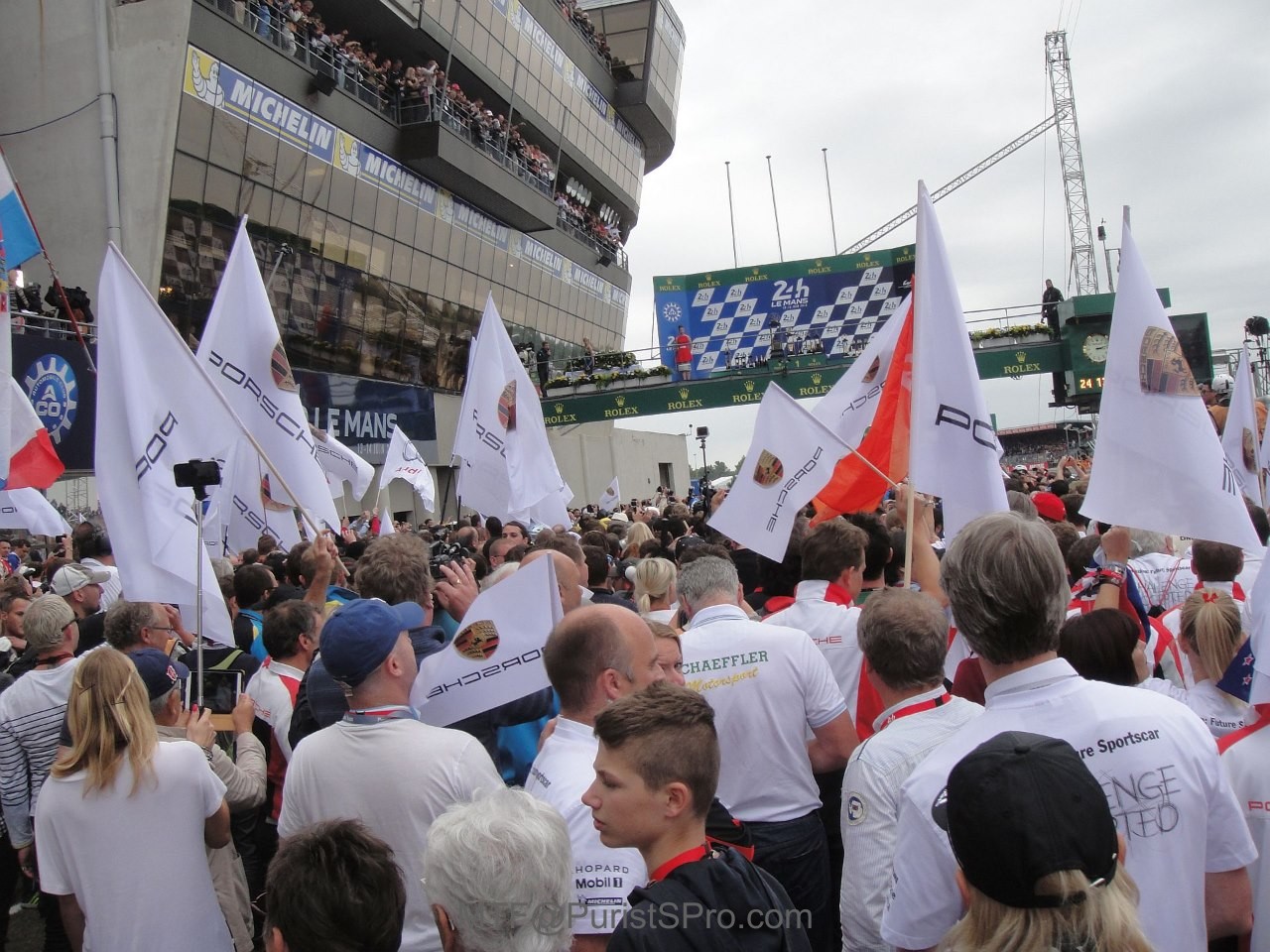 We throng to the podium