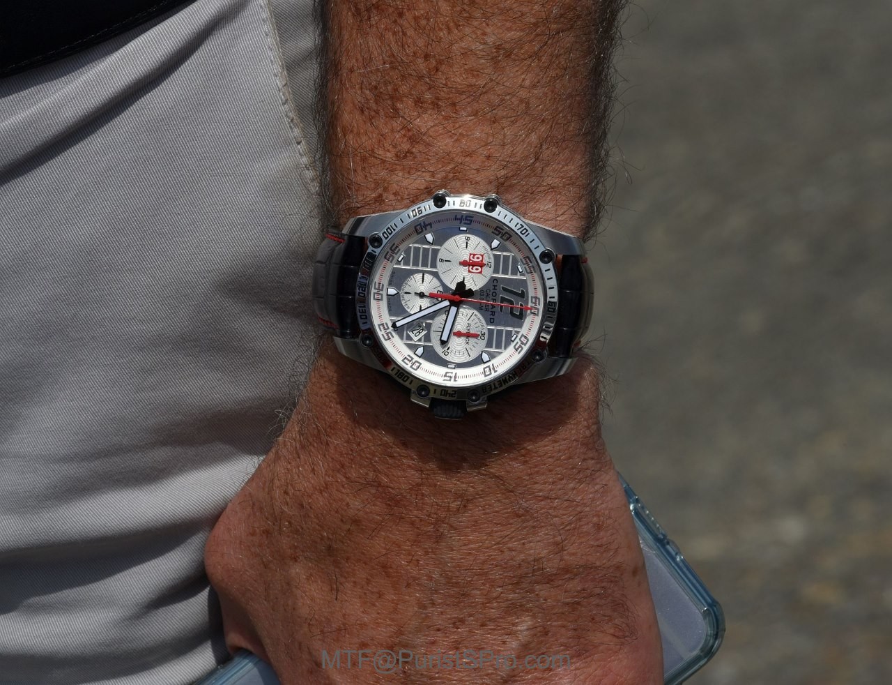 6A) Left wrist owner: Red stitched leather strap; Easy to ID?