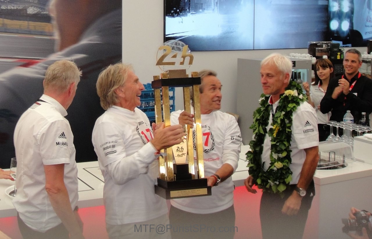 Derek Bell and Jacky Ickx help out
