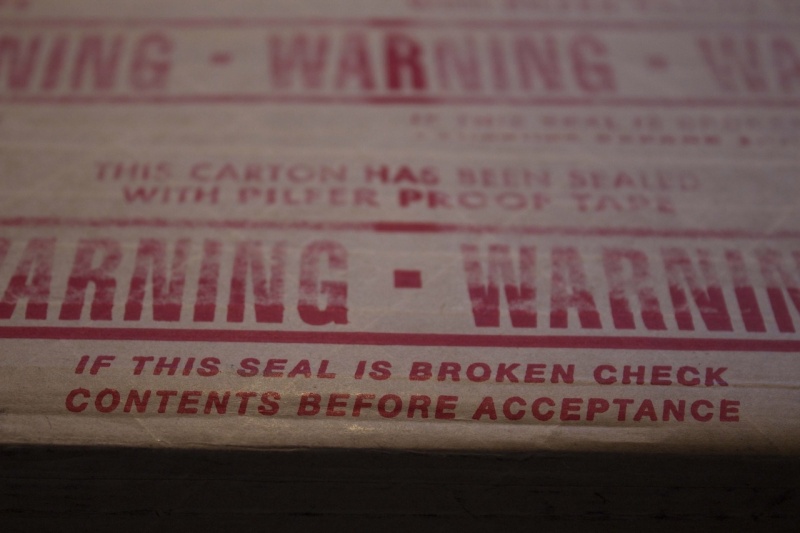 No Pilfering! And yes, the tape works. It was hard to get this package open even with a knife! 