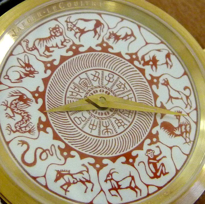 White enamel with (sort of) vermilion coloured motif