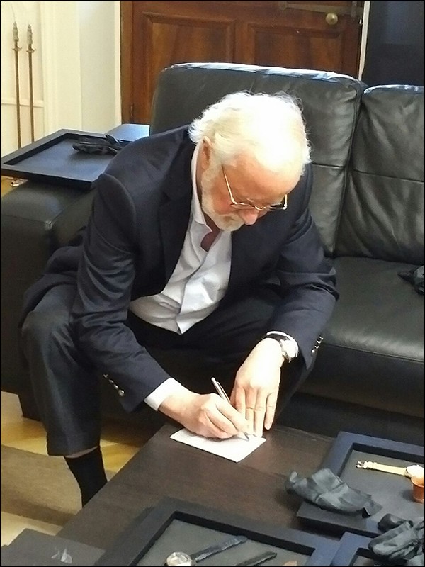 Finally Mr. Ferrier signing a nice note on my watch warranty card. 