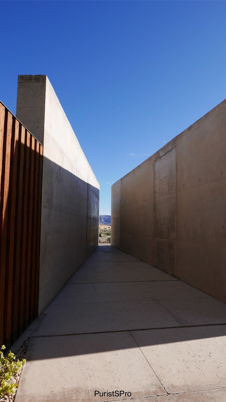 Wall feature along and in between suites.