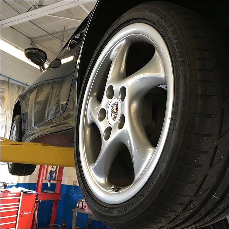 18 inch Turbo twist getting checked for proper inflation after a long winter.