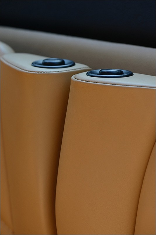Rear seat release, and stitched leather. Robust as can be