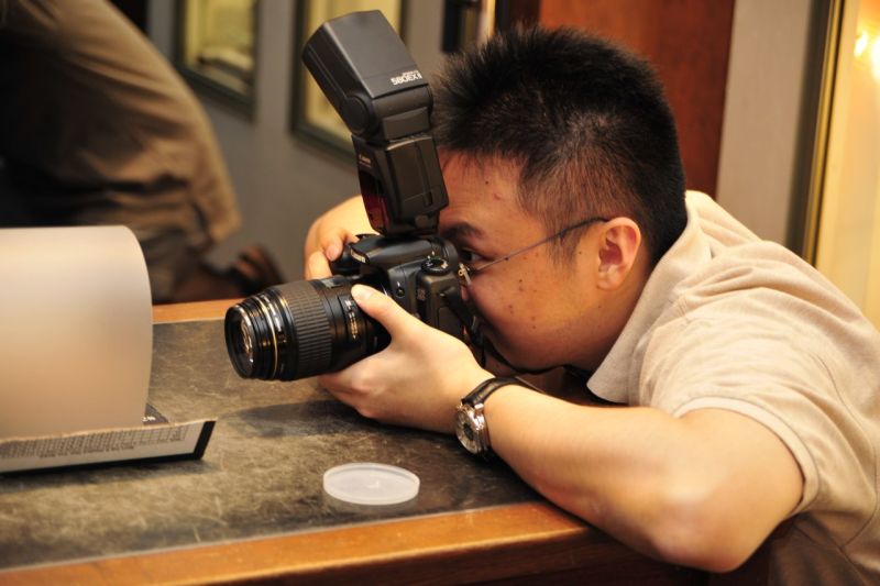 JX - with intense concentration - taking shots of the watches - new year's eve