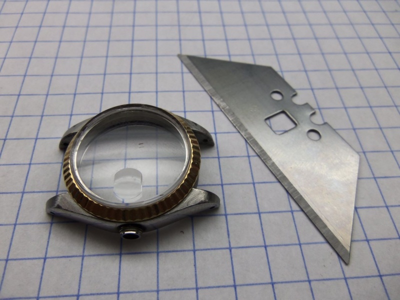Removing bezel and crystal.