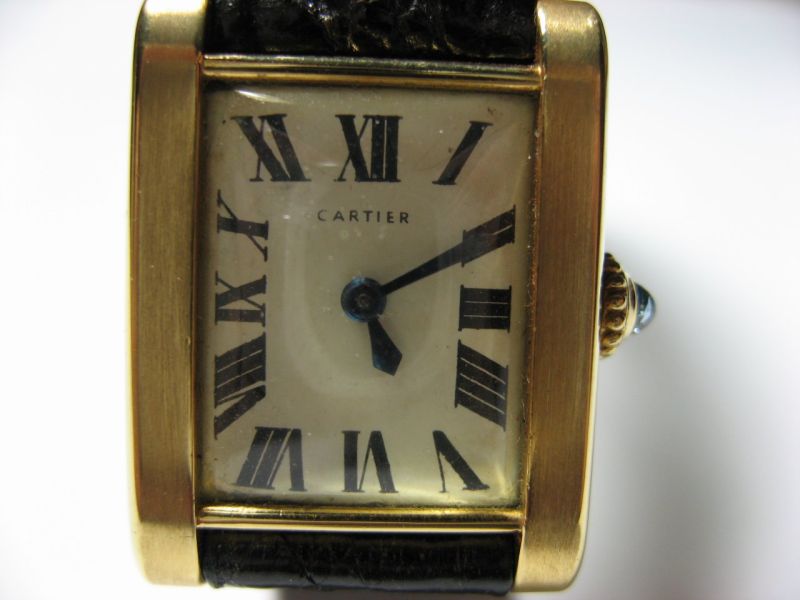 Cartier mini tank winding