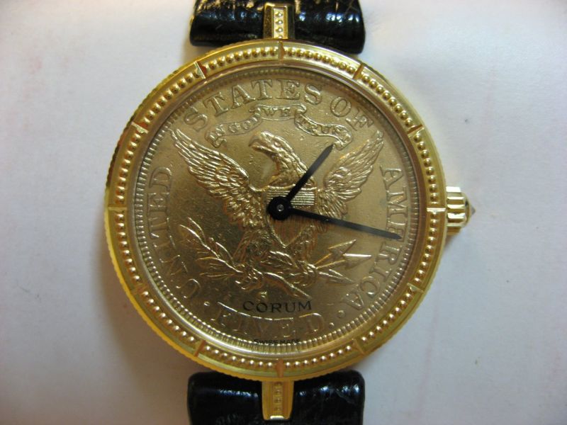 Coin watch winding