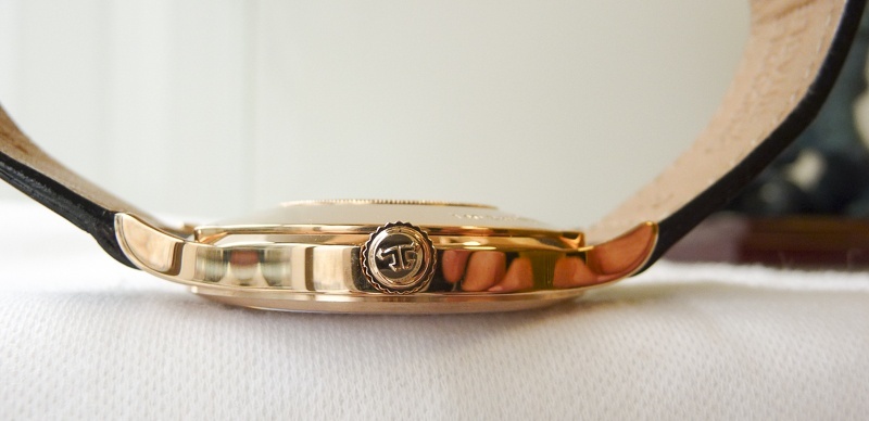 A slightly thicker case to accommodate the enamel dial.