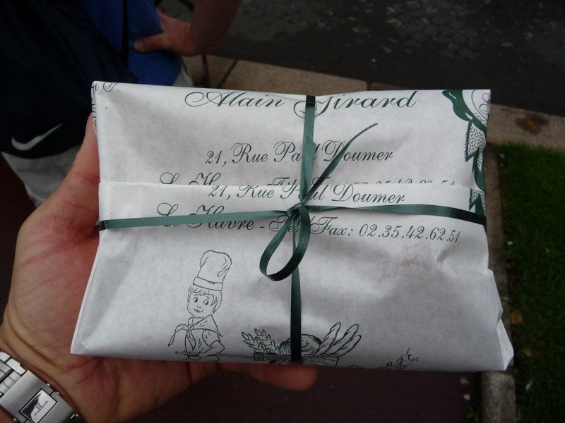 Perhaps a pastry...note the bottom left corner of the photo