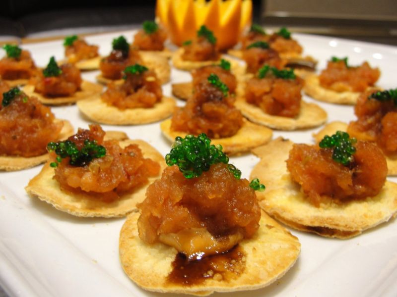 Spicy tuna on a crisp cracker.