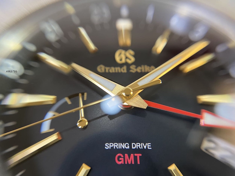 Grand Seiko SBGE215 GMT Titanium/ Gold accents NIB watch listing