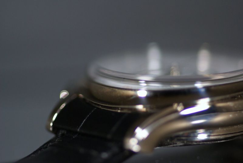 Bezel protecting sides of crystal