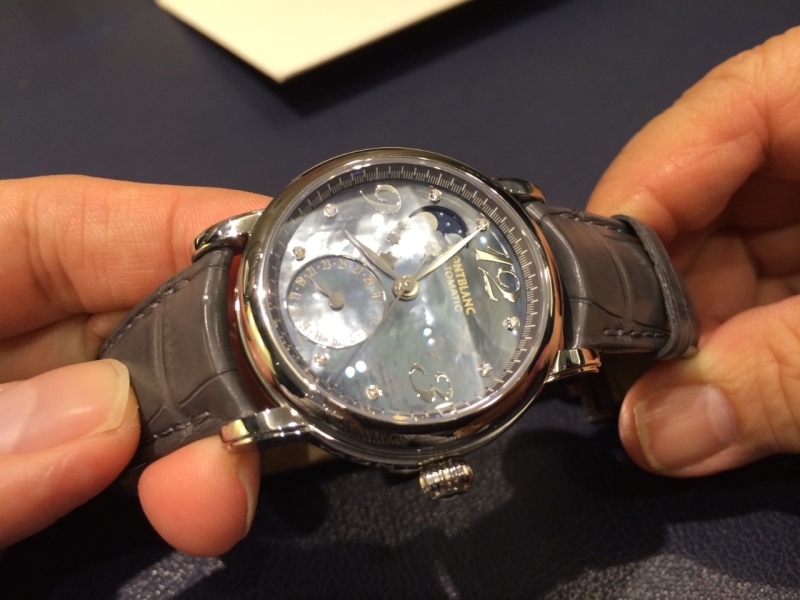 My mom and I holding the watch together...
