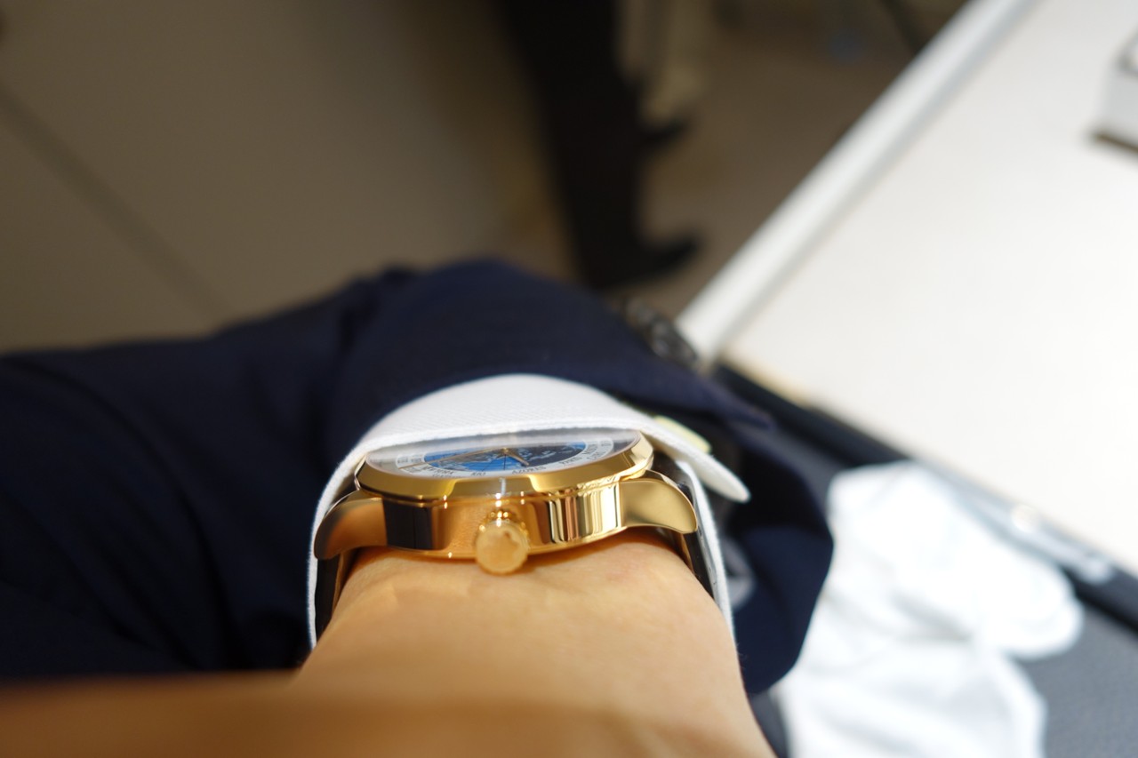 The Orbis Terrarum on my small wrist. Although my shirt is fitted, the Orbis Terrarum still fits under my shirt cuff.
