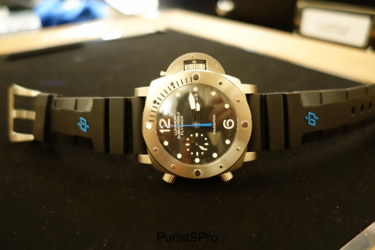 This is the titanium version, it's a handsome watch. It also has a date and a 60 minute chronograph - the minute hand is under the second hand.