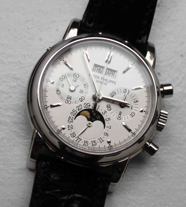 What about a shot from another angle? Now the silver looks a bit closer to classic Patek opaline white, not detracting at all from its legibility and understated appeal. The platinum would fly under the radar, while the yellow gold exudes warmth and a vintage look.
