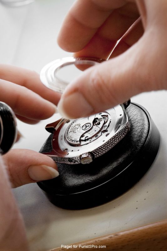 Fitting the case back with sapphire crystal.