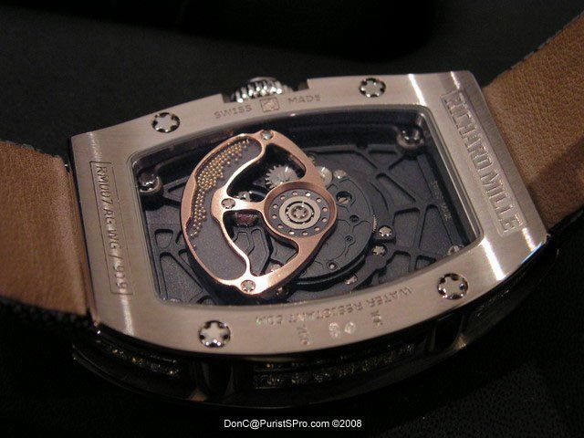 Here we see the neat rotor with rolling gold balls as weights