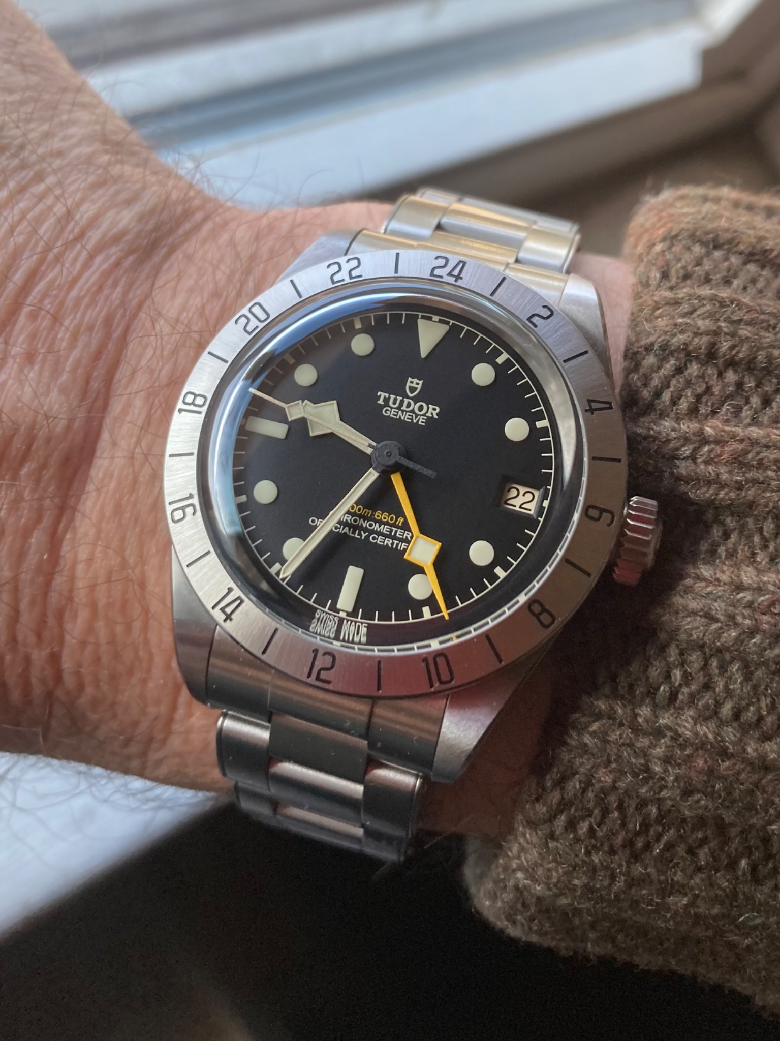Watch by Rolex, Tudor