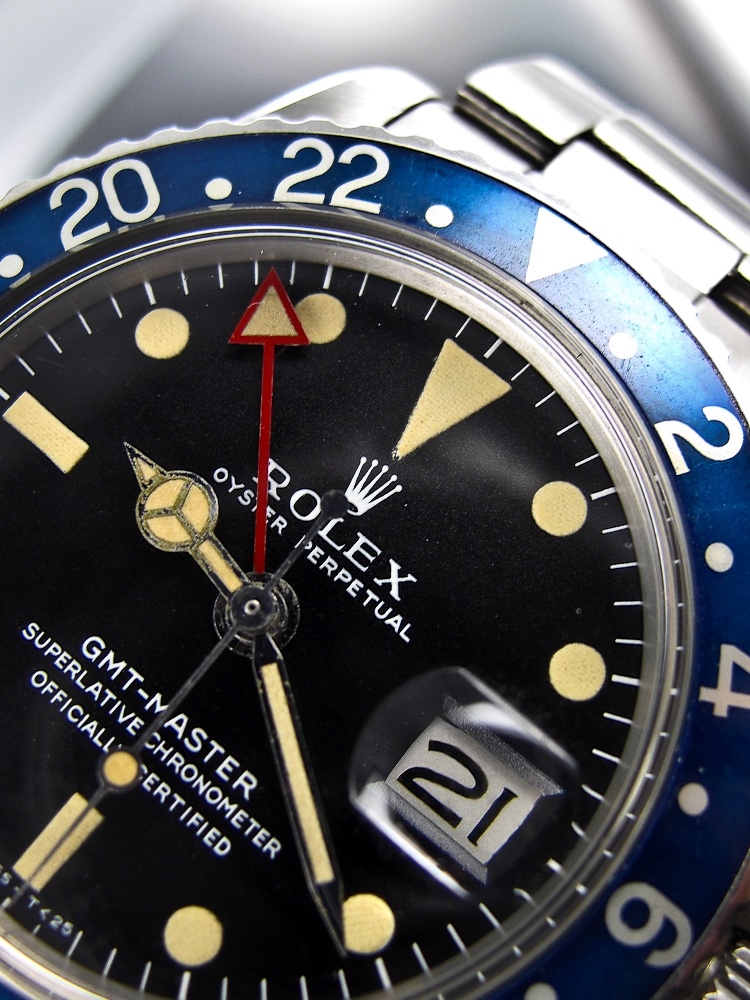 The Rolex 1675 with all red hand and Blue insert