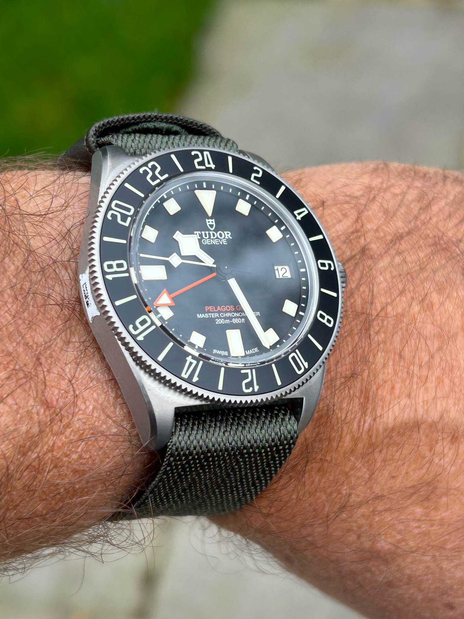 Watch by Rolex, Tudor