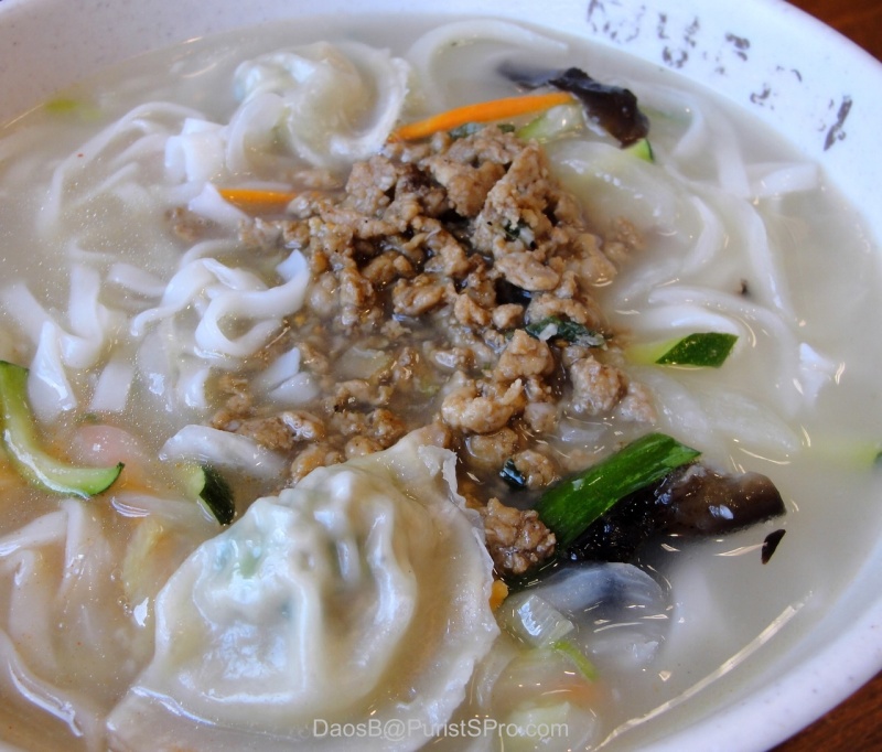 The famous kalguksu. Hand-cut noodles in a relatively bland broth with dumplings.