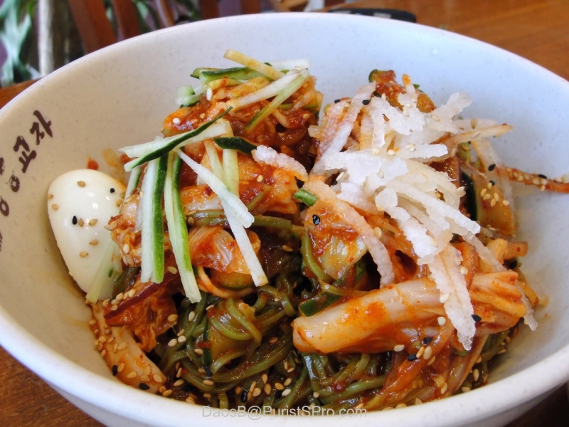 Spicy noodles flavored with algae (note the green color).