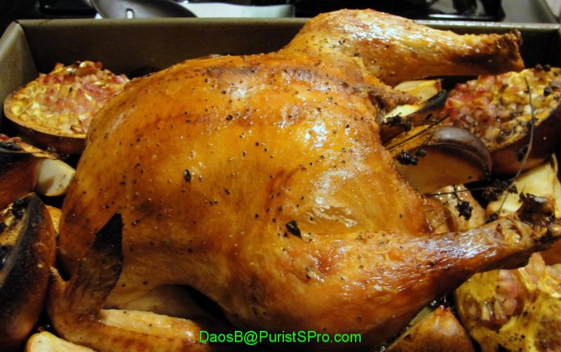 Roasted chicken flavored with marjoram, stevia, pears, pomegranates, and garlic.