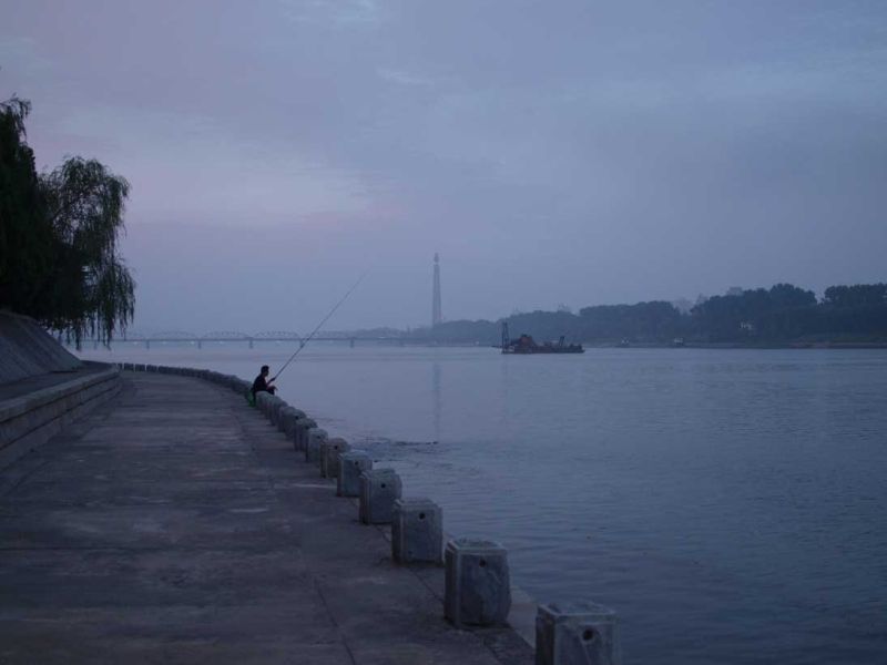 Fishing by the hotel compound. By the time I got to him, he immediately packed and left.