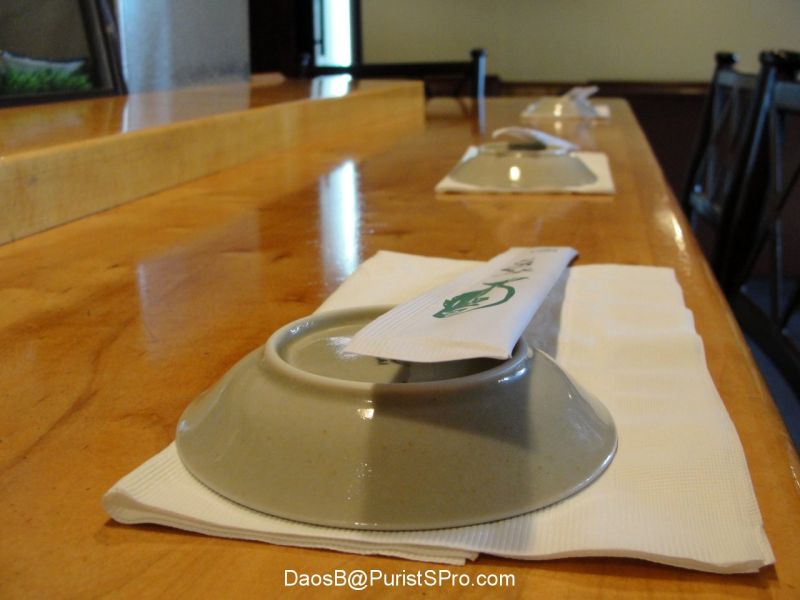 The lunch crowd has left. I'm alone at the bar.