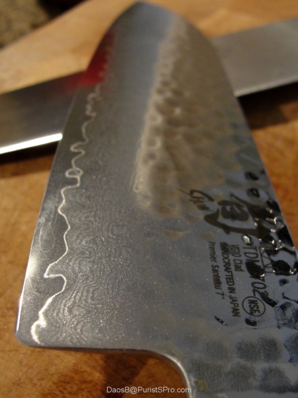The waterfall edge where the Damascus steel meets the high carbon steel core.