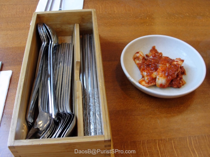 A traditional presentation of silverware at a Korean restaurant.