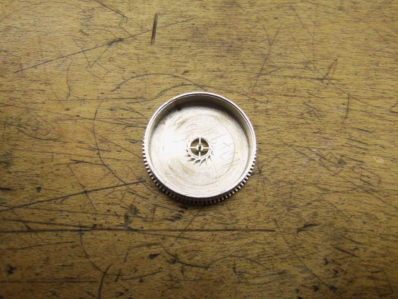 Escape wheel placed onto barrel.