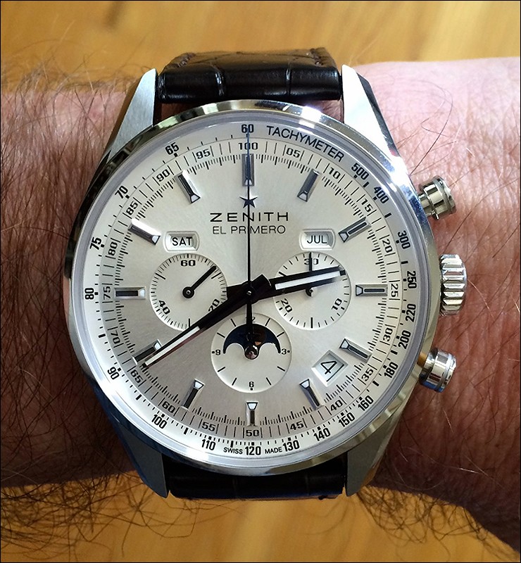 The higly polished hands vary from silver to black depending on the viewing angle.